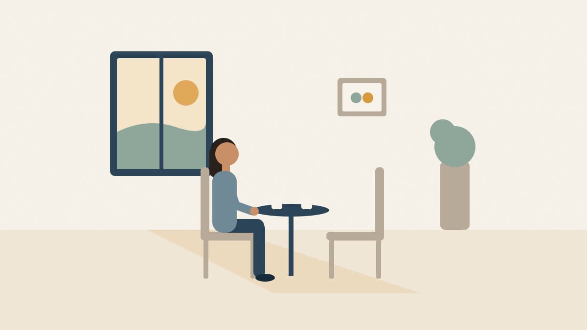 Illustration of a person seated at a small table set for two, with an empty chair lit by window light